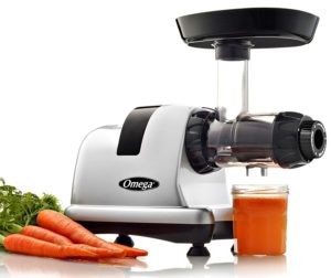 photo of omega juicer with carrots