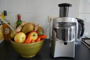 photo of juicer and fruits